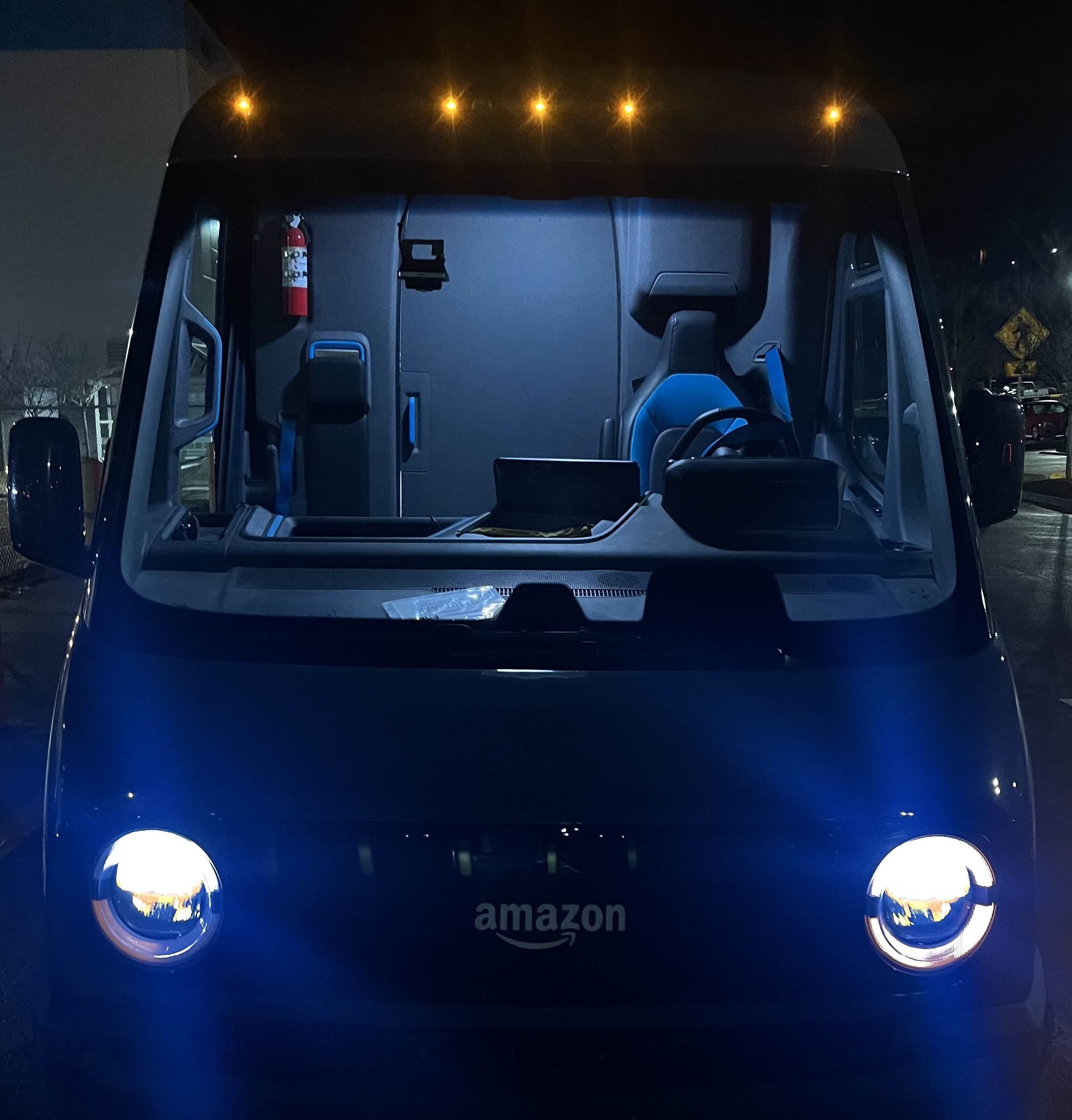 Amazon-branded electric delivery van at the Winter Express Knoxville station